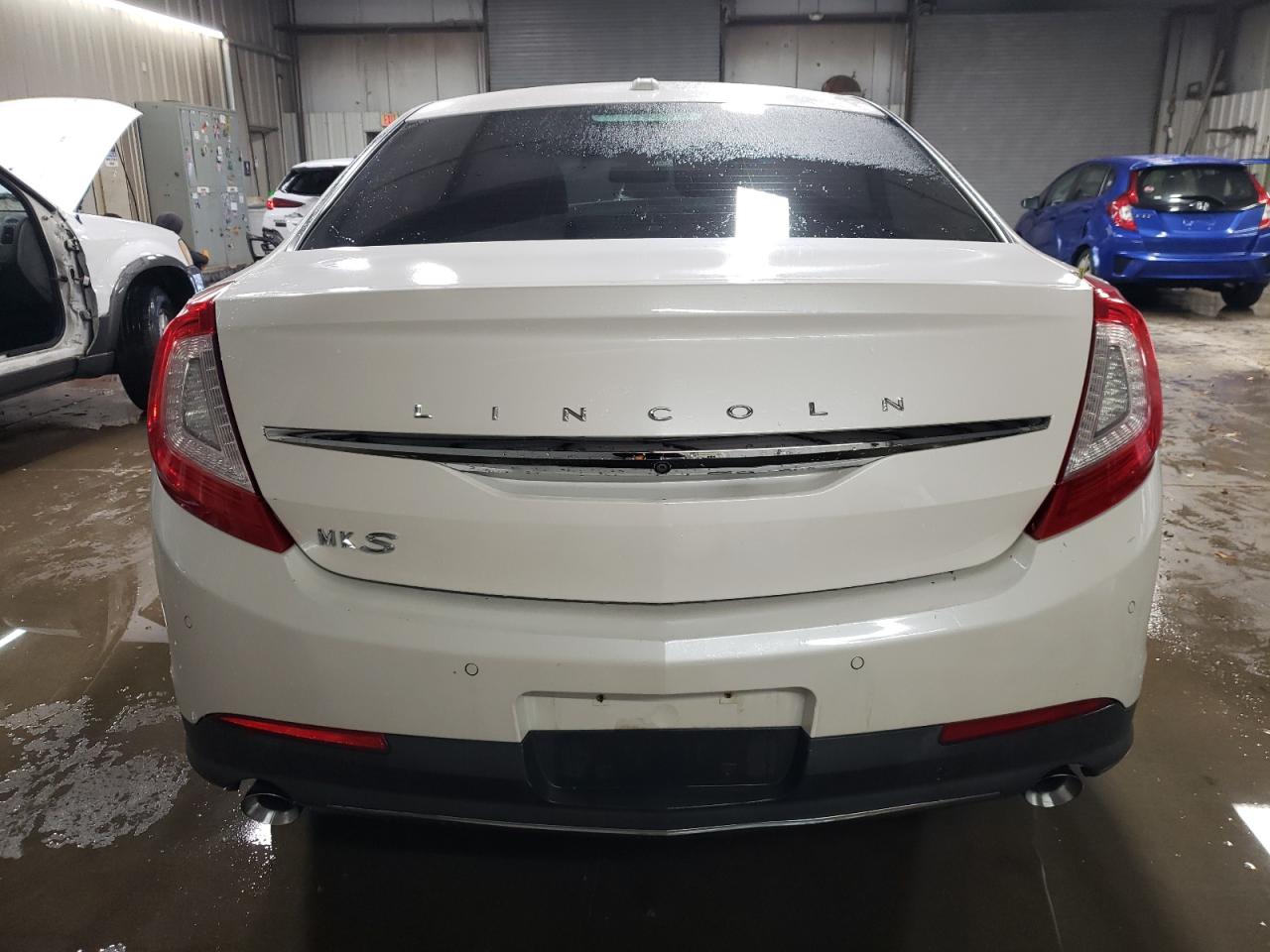 2016 Lincoln Mks VIN: 1LNHL9DK0GG601318 Lot: 80114224