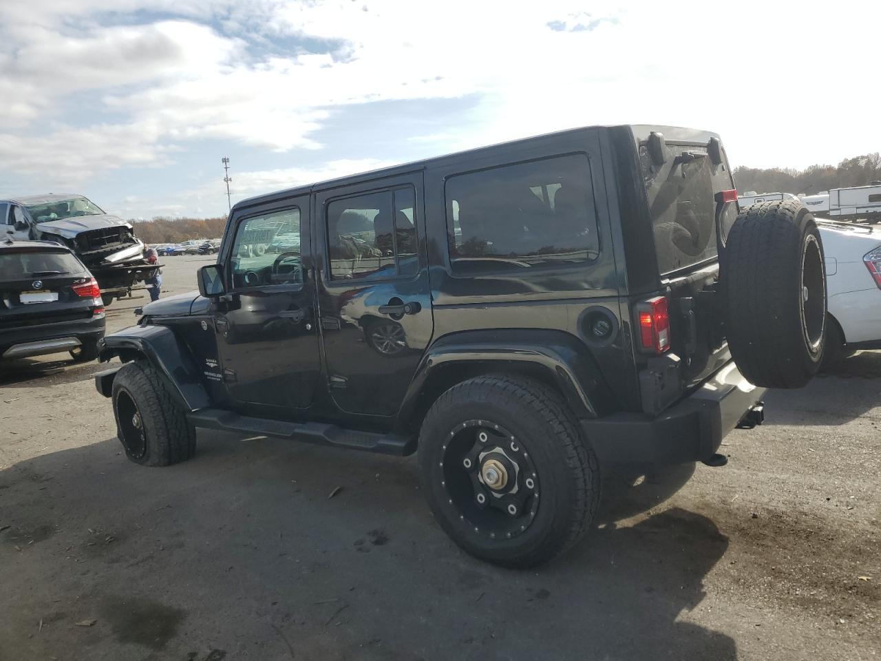 2015 Jeep Wrangler Unlimited Sahara VIN: 1C4HJWEG6FL663590 Lot: 79087234