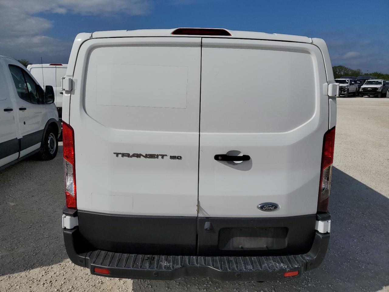 2019 Ford Transit T-150 VIN: 1FTYE1YM0KKB79892 Lot: 77016874