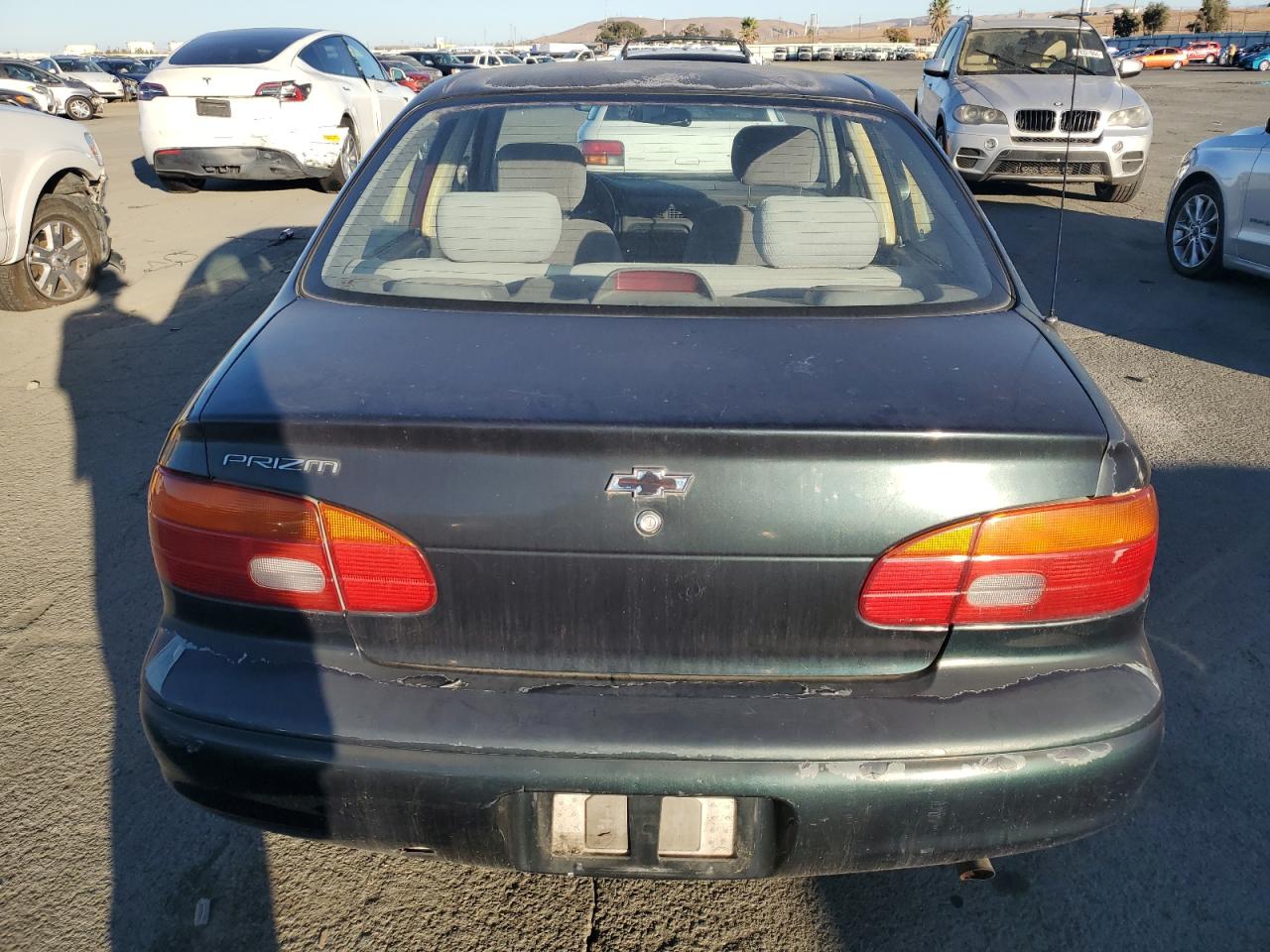 1999 Chevrolet Geo Prizm Base VIN: 1Y1SK5289XZ411868 Lot: 79348064