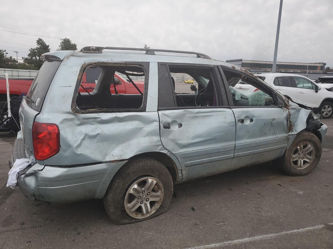 2003 Honda Pilot Exl VIN: 2HKYF18523H597568 Lot: 80630004