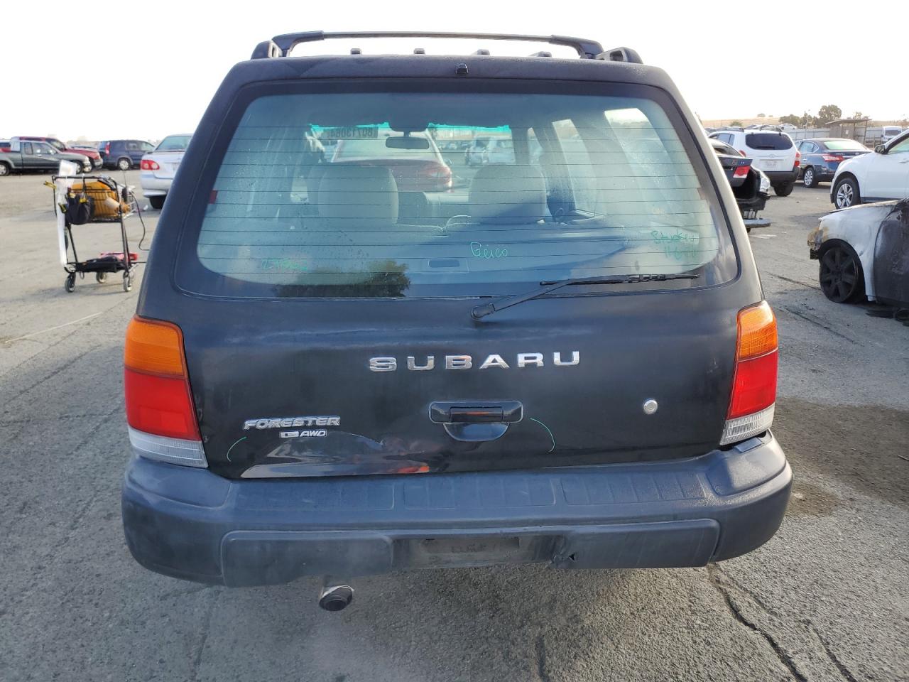 2000 Subaru Forester L VIN: JF1SF6350YH729247 Lot: 80713064