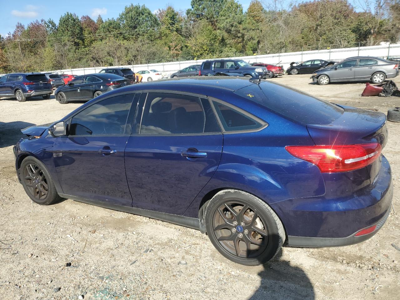 2016 Ford Focus Se VIN: 1FADP3F27GL242659 Lot: 79849844