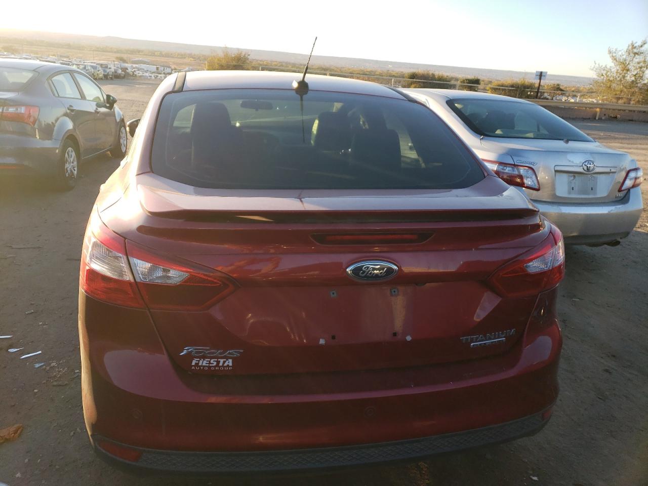 2014 Ford Focus Titanium VIN: 1FADP3J23EL169097 Lot: 78745634