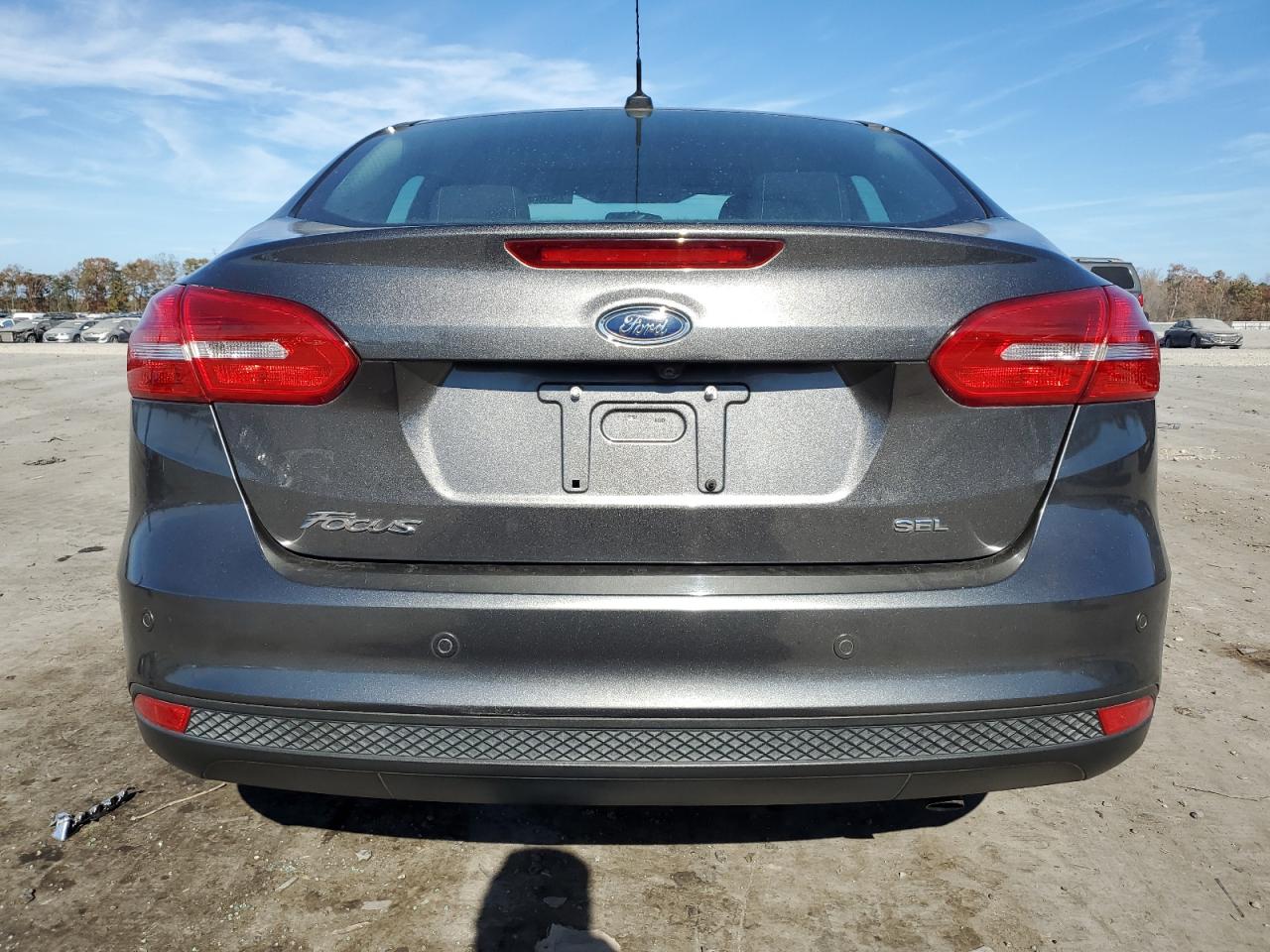 VIN 1FADP3H25JL245399 2018 FORD FOCUS no.6