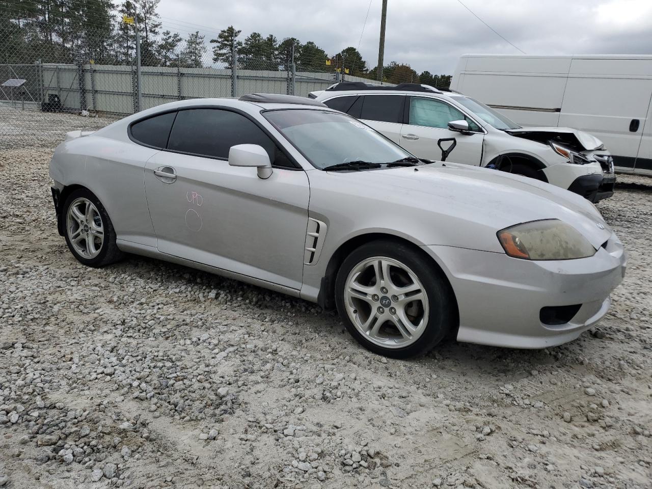 2005 Hyundai Tiburon VIN: KMHHM65D05U184230 Lot: 80068374