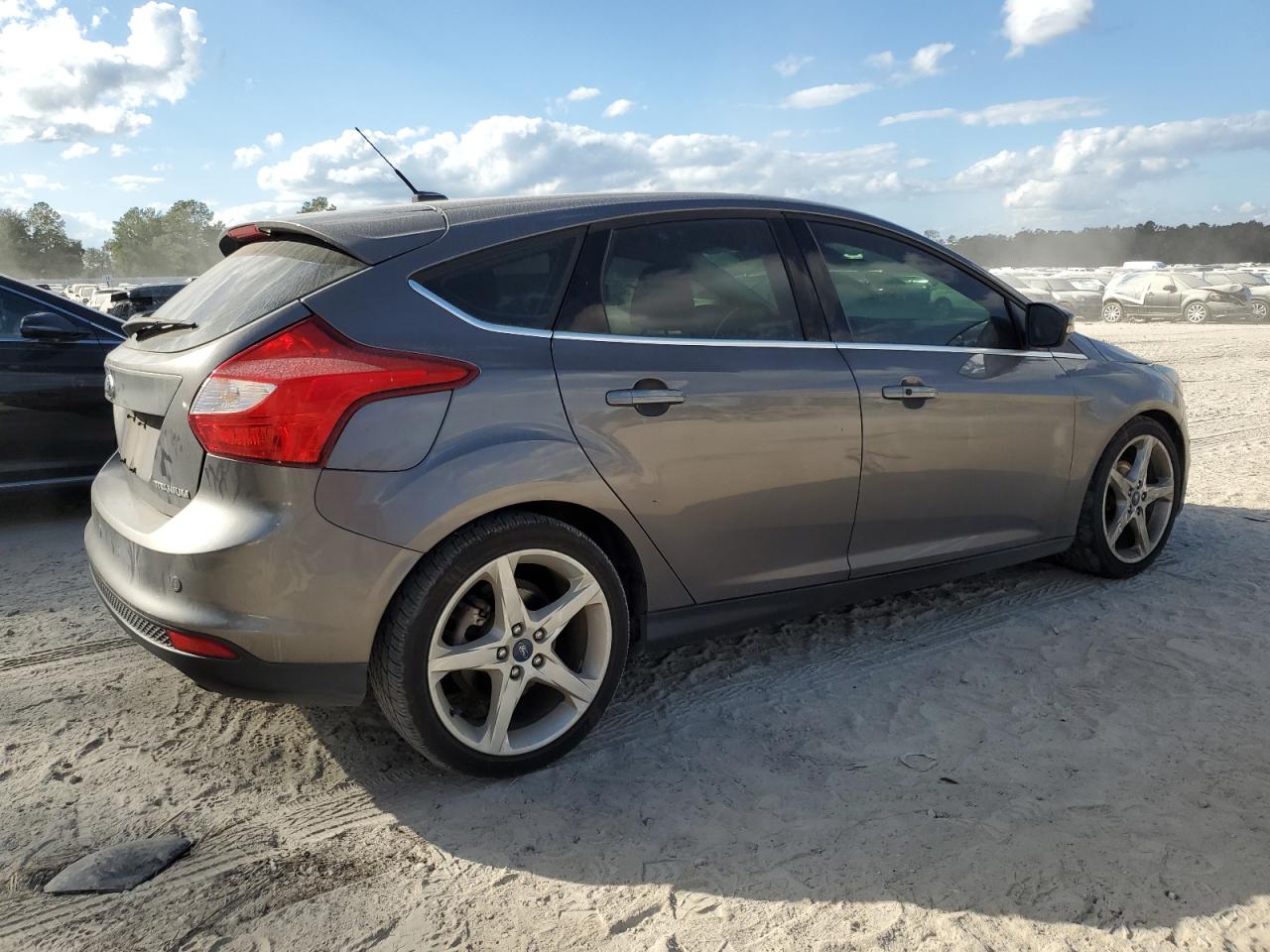 2012 Ford Focus Titanium VIN: 1FAHP3N26CL277111 Lot: 76823744