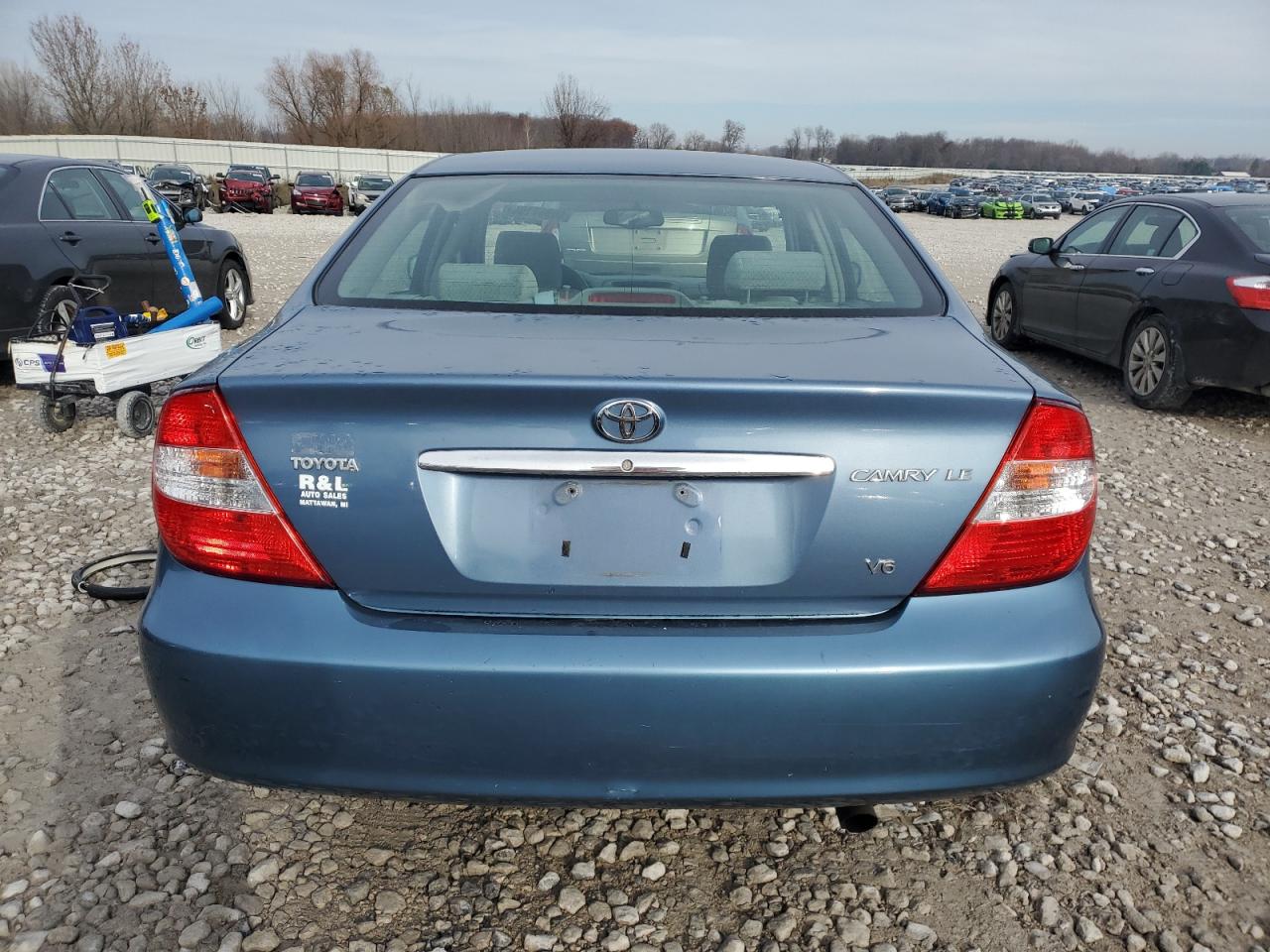 2004 Toyota Camry Le VIN: 4T1BF32K74U587802 Lot: 80967194