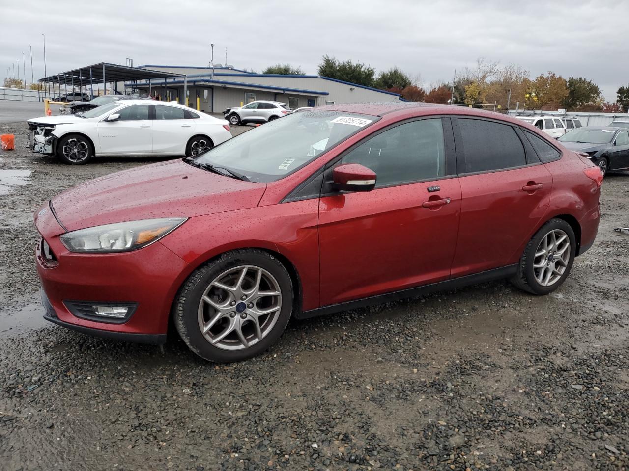 VIN 1FADP3F28FL292811 2015 FORD FOCUS no.1