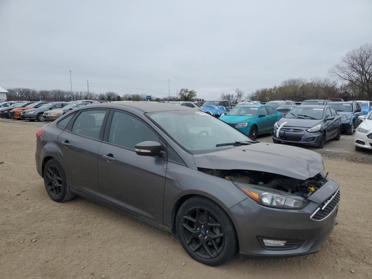 VIN 1FADP3F2XGL268043 2016 FORD FOCUS no.4