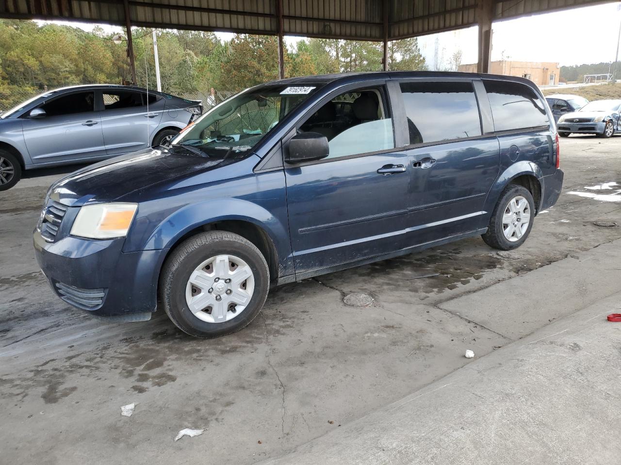 2009 Dodge Caravan - Image 1