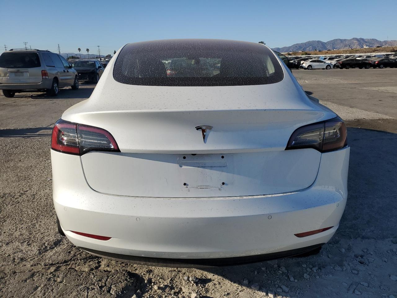 2018 Tesla Model 3 VIN: 5YJ3E1EA2JF009985 Lot: 81104004