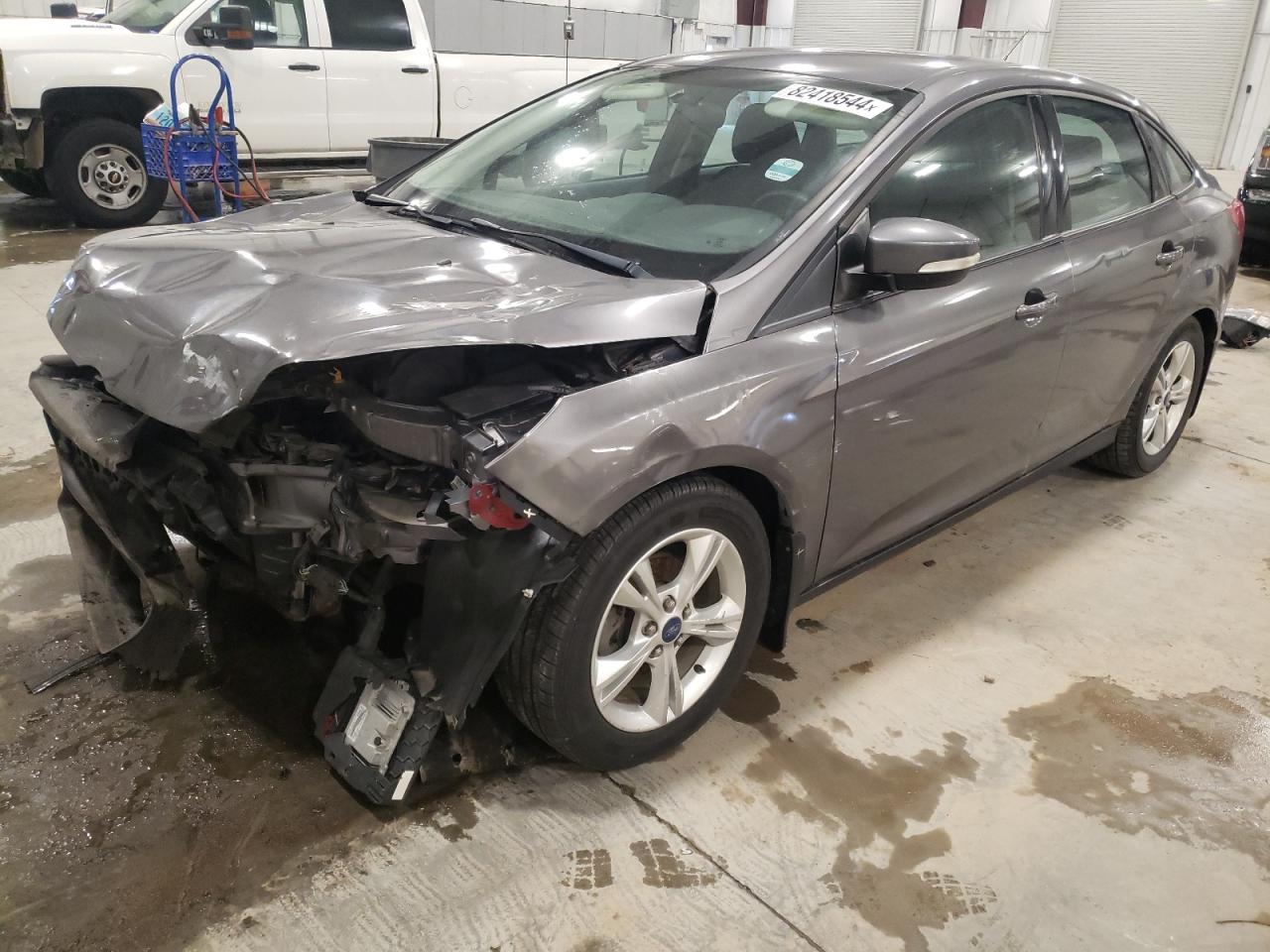 VIN 1FADP3F21EL131490 2014 FORD FOCUS no.1