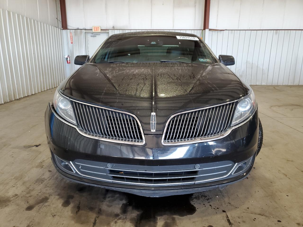 2015 Lincoln Mks VIN: 1LNHL9EK7FG606710 Lot: 79824514