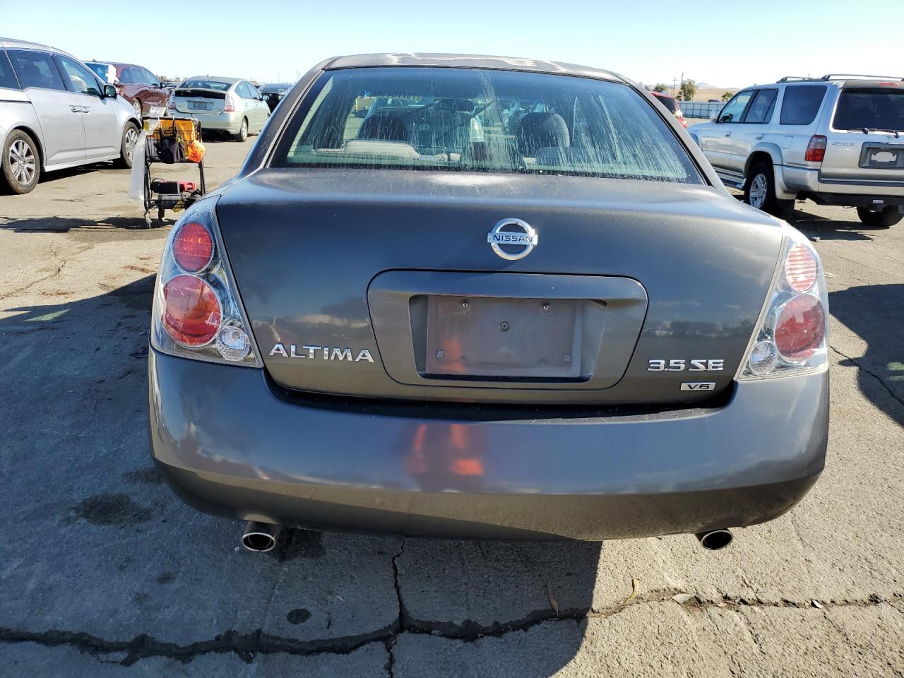 2005 Nissan Altima Se VIN: 1N4BL11D05N410899 Lot: 79776414