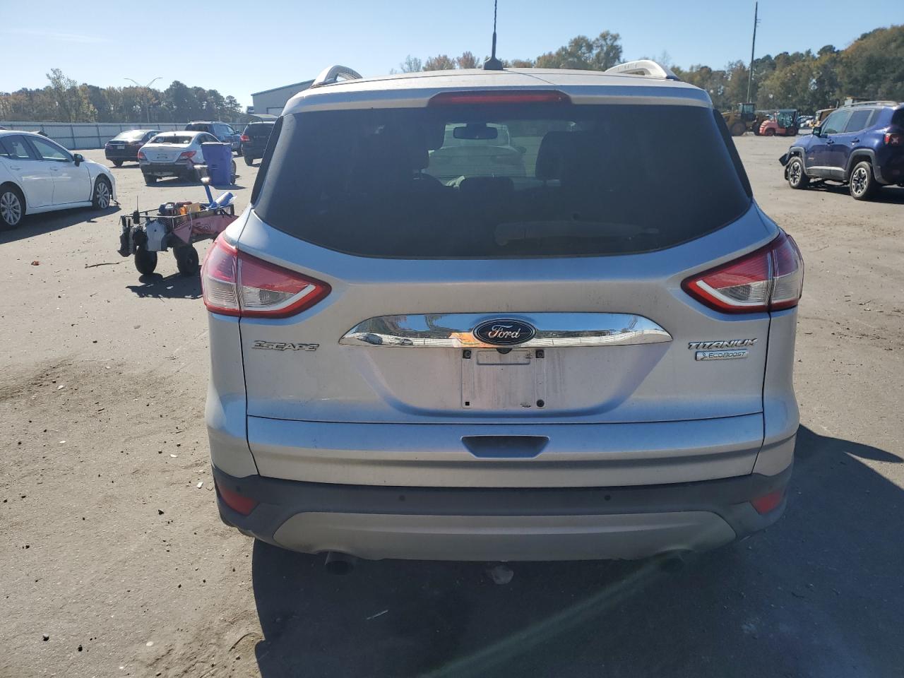 2015 Ford Escape Titanium VIN: 1FMCU0J98FUB69064 Lot: 80002034