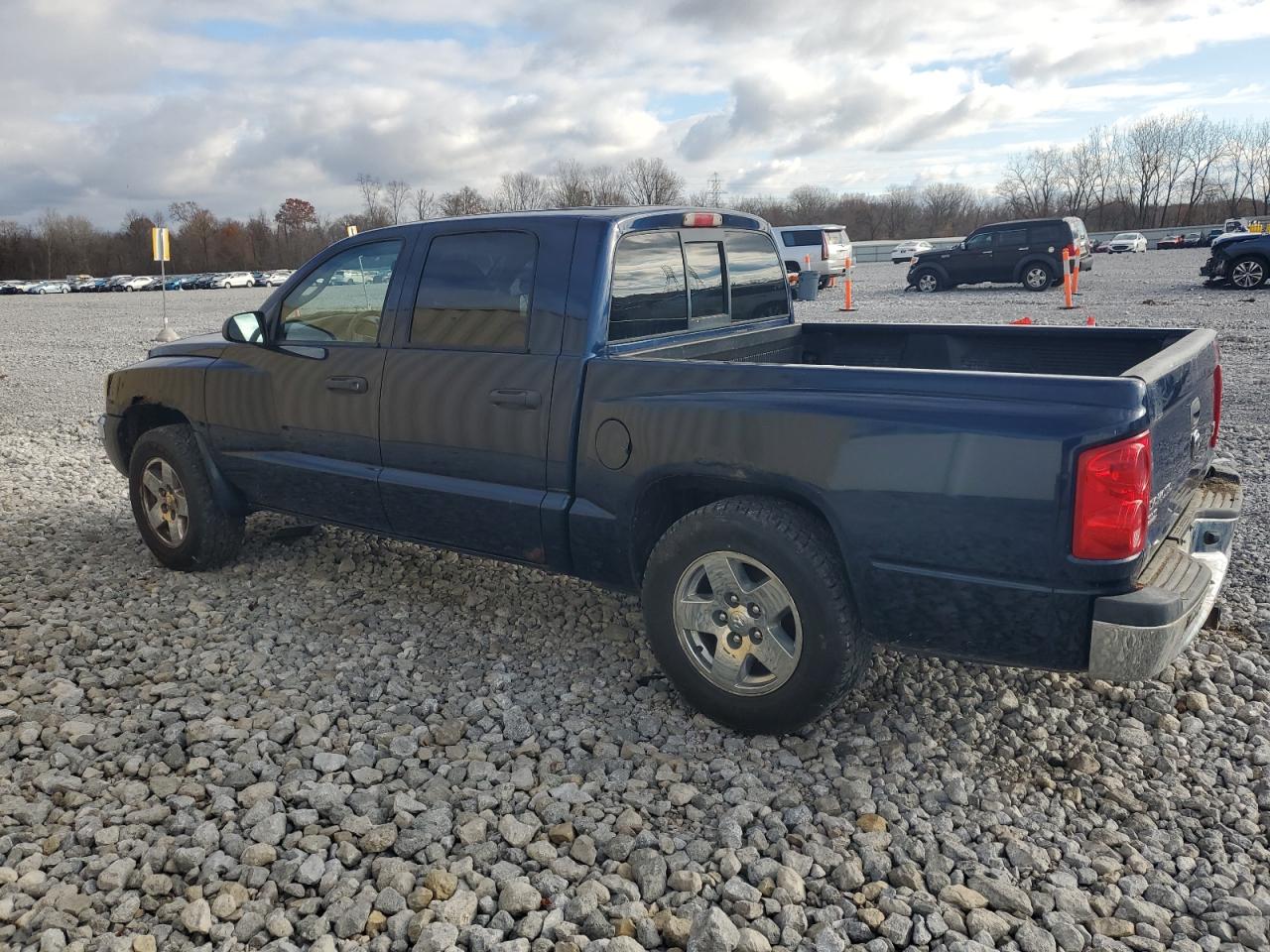 2005 Dodge Dakota Quad Slt VIN: 1D7HE48N25S304783 Lot: 79870154