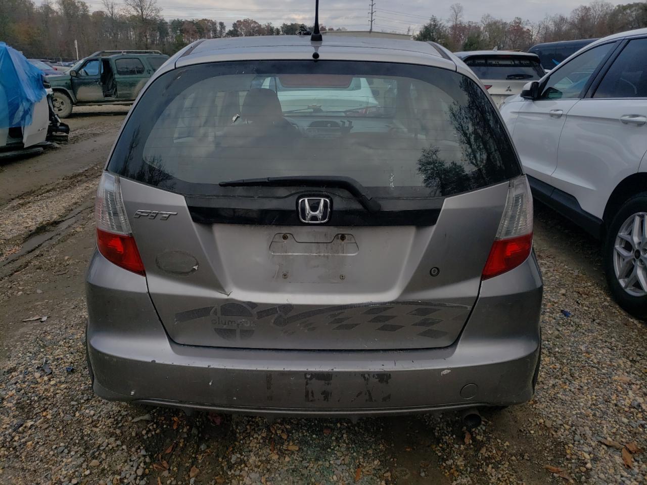 2010 Honda Fit VIN: JHMGE8H25AS011486 Lot: 79423274