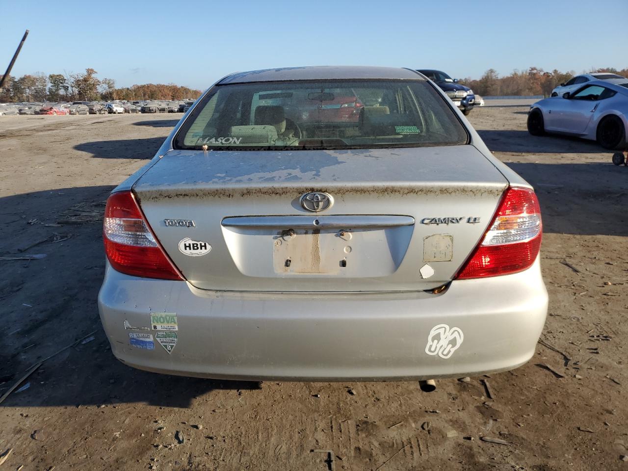 2004 Toyota Camry Le VIN: JTDBE32K040298355 Lot: 79318054