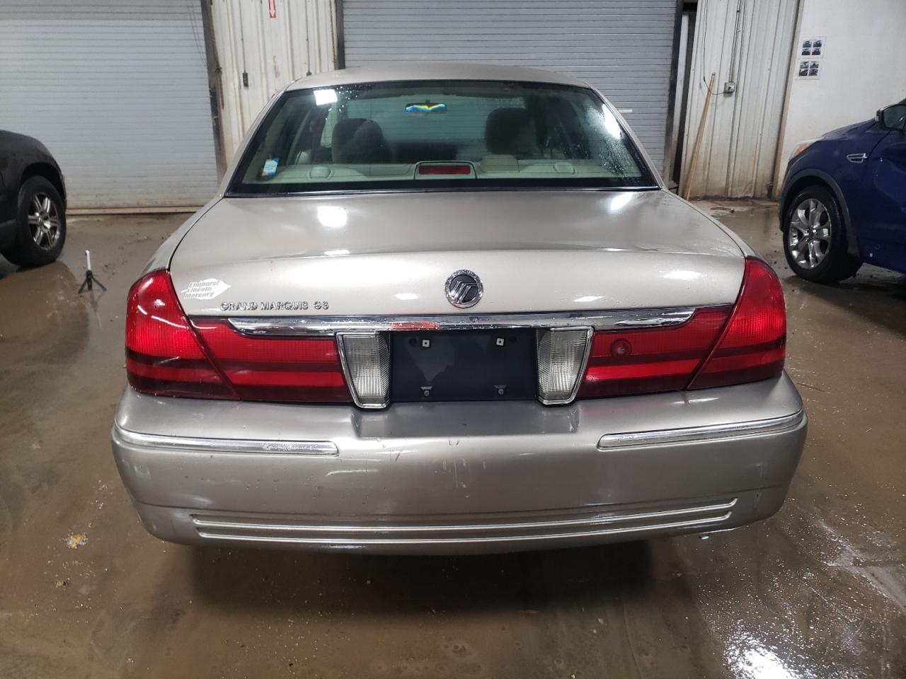 2003 Mercury Grand Marquis Gs VIN: 2MEFM74WX3X657513 Lot: 81355024