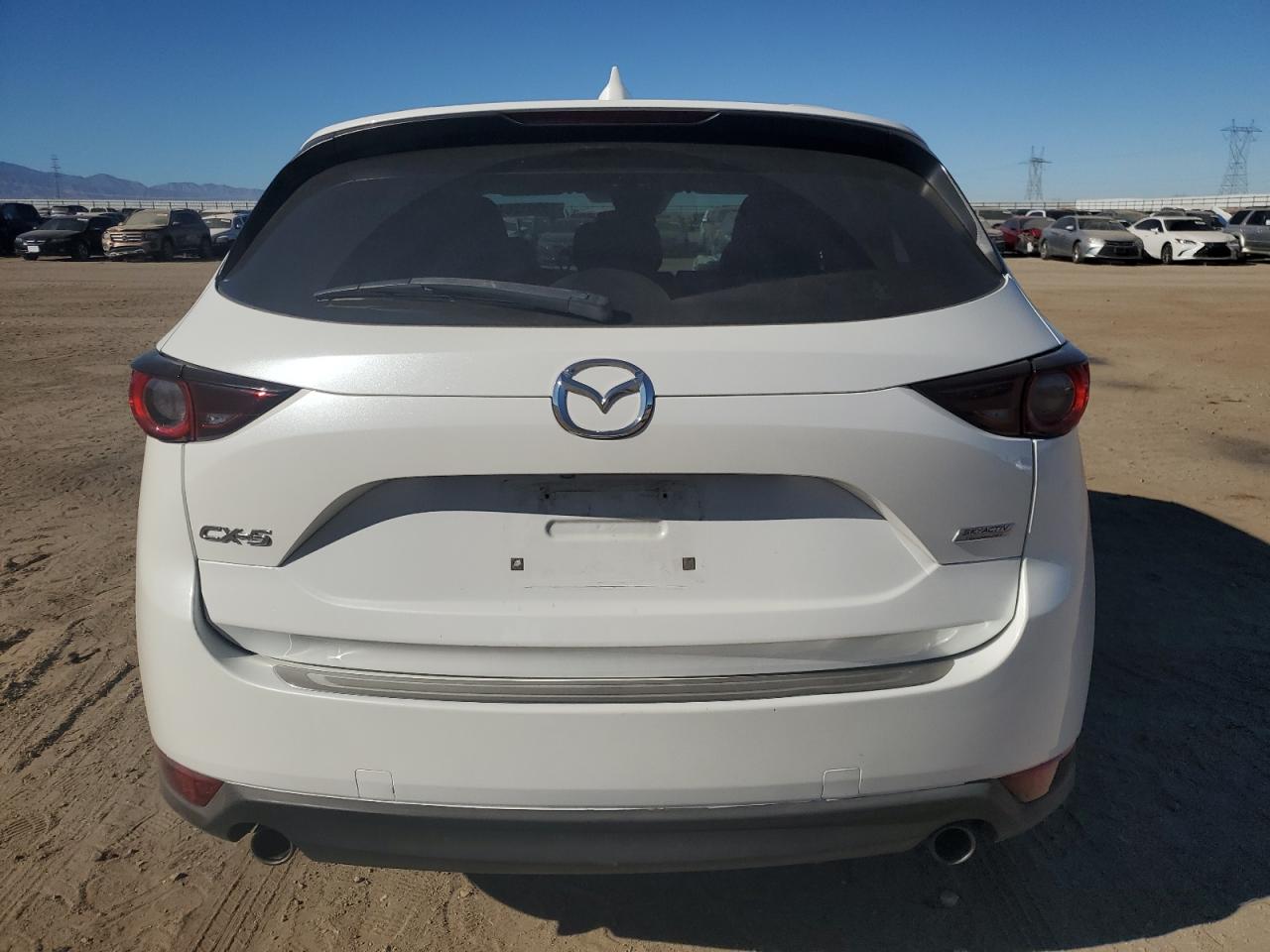 2019 Mazda Cx-5 Touring VIN: JM3KFACM3K1645029 Lot: 79903204