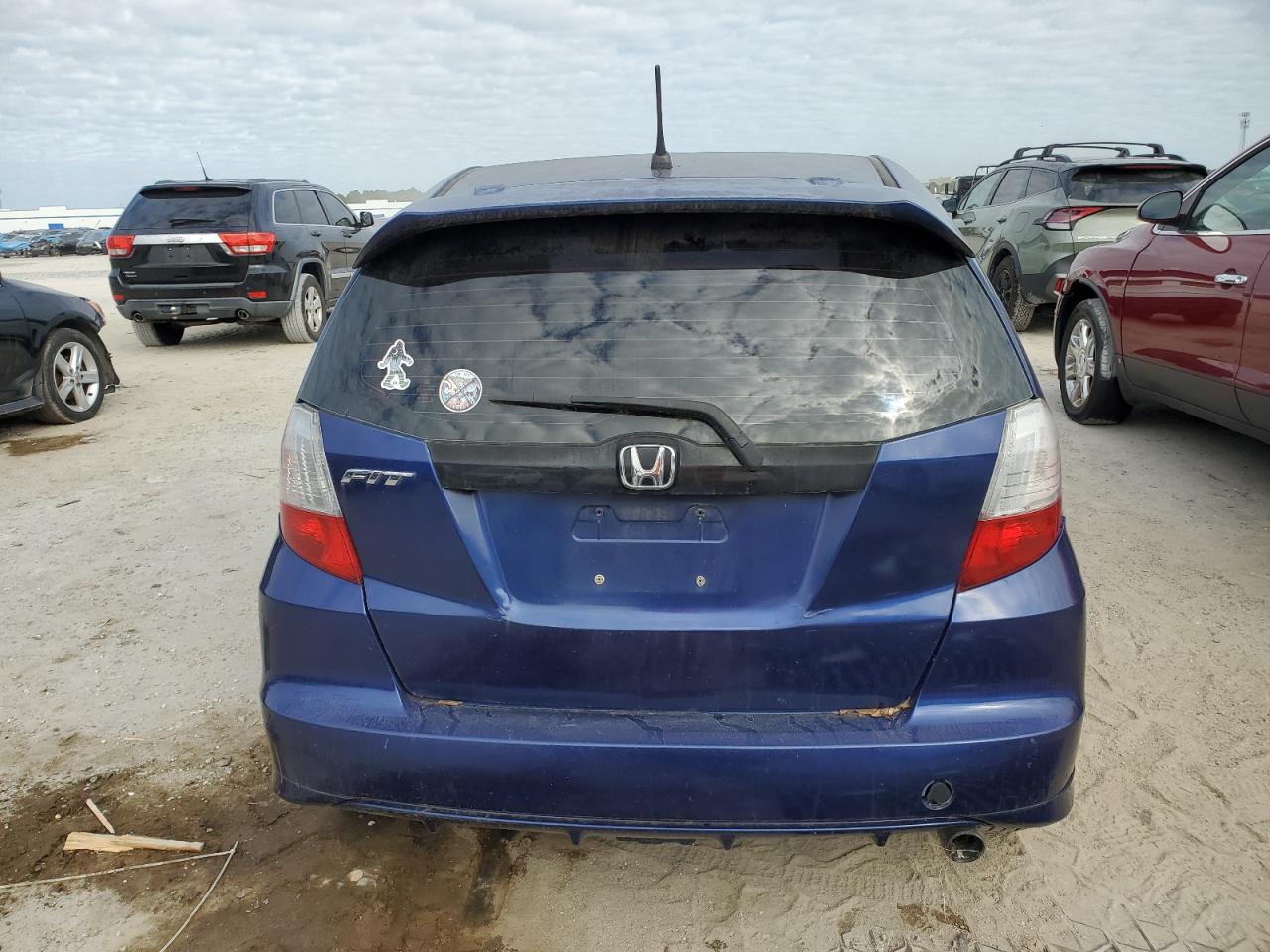 2009 Honda Fit Sport VIN: JHMGE88489S058623 Lot: 81470964