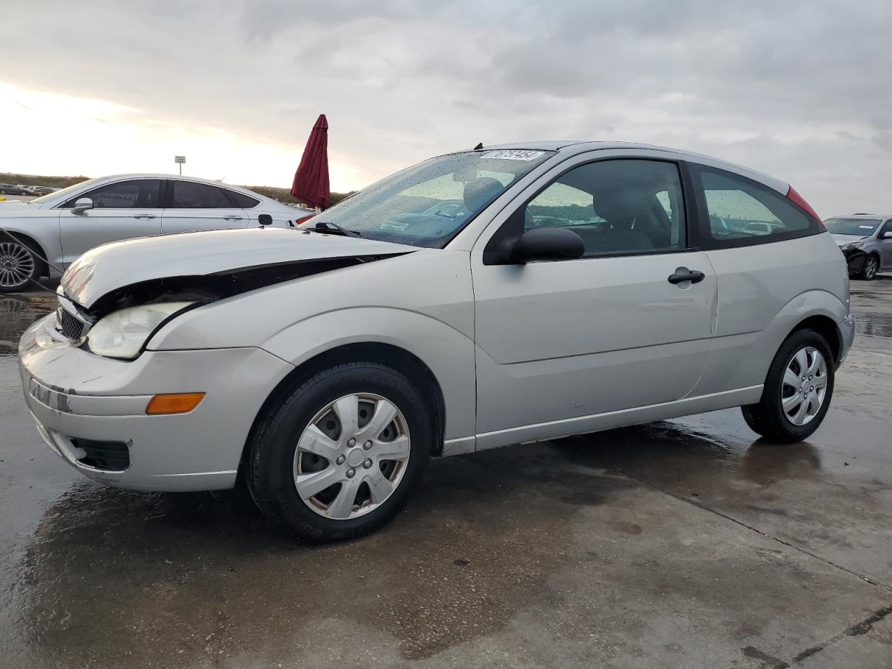 2007 Ford Focus Zx3 VIN: 1FAFP31N97W348989 Lot: 78757454