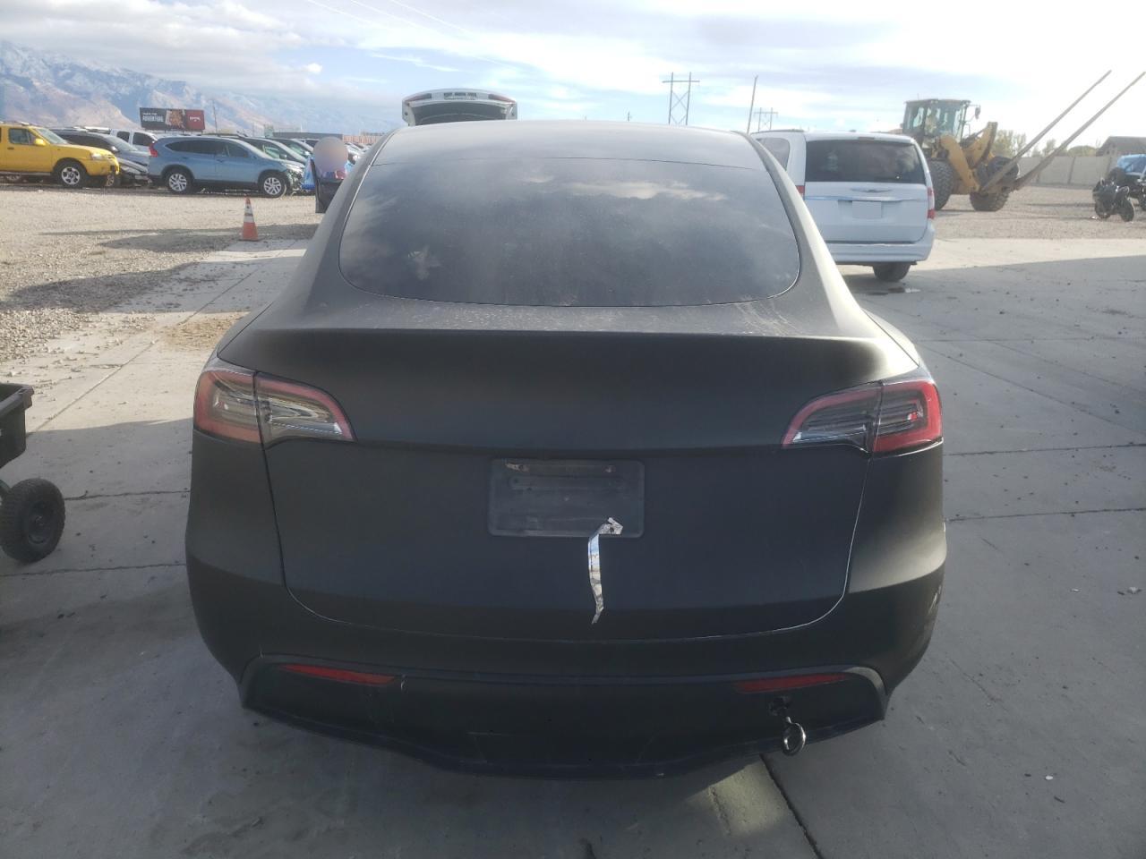 2023 Tesla Model Y VIN: 7SAYGDEE9PF631306 Lot: 78879294