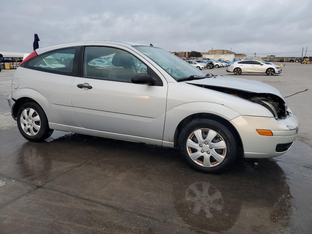 2007 Ford Focus Zx3 VIN: 1FAFP31N97W348989 Lot: 78757454