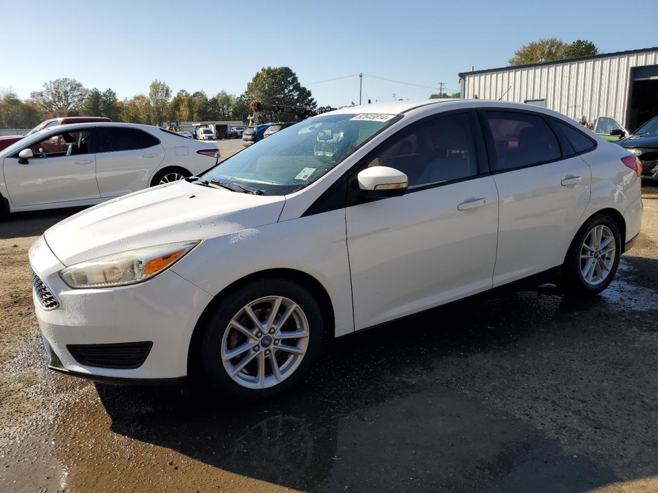 VIN 1FADP3F26FL336465 2015 FORD FOCUS no.1