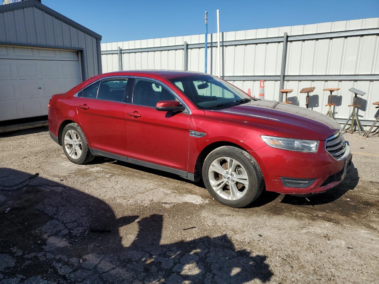 VIN 1FAHP2E82FG100647 2015 FORD TAURUS no.4