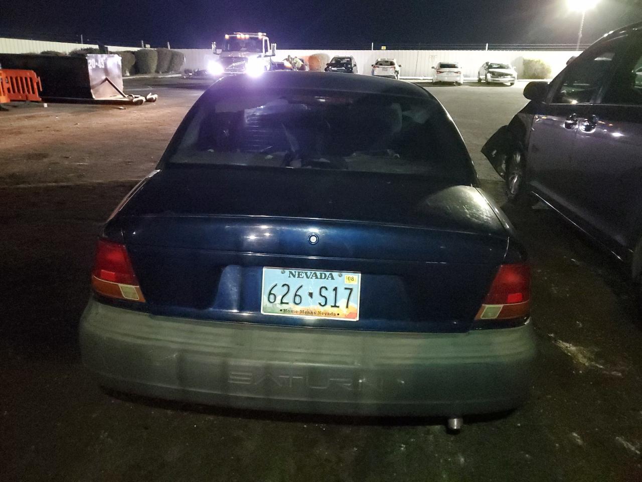 1999 Saturn Sl1 VIN: 1G8ZH5289XZ336486 Lot: 83240394