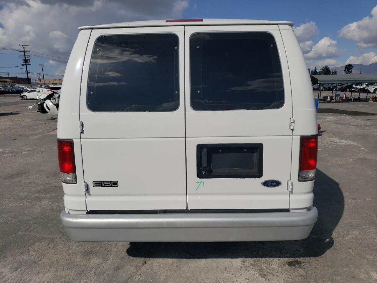 1999 Ford Econoline E150 Van VIN: 1FTRE1420XHB49837 Lot: 80168354