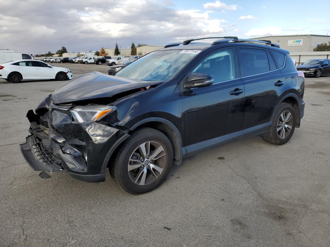 VIN 2T3RFREV3HW676948 2017 TOYOTA RAV4 no.1