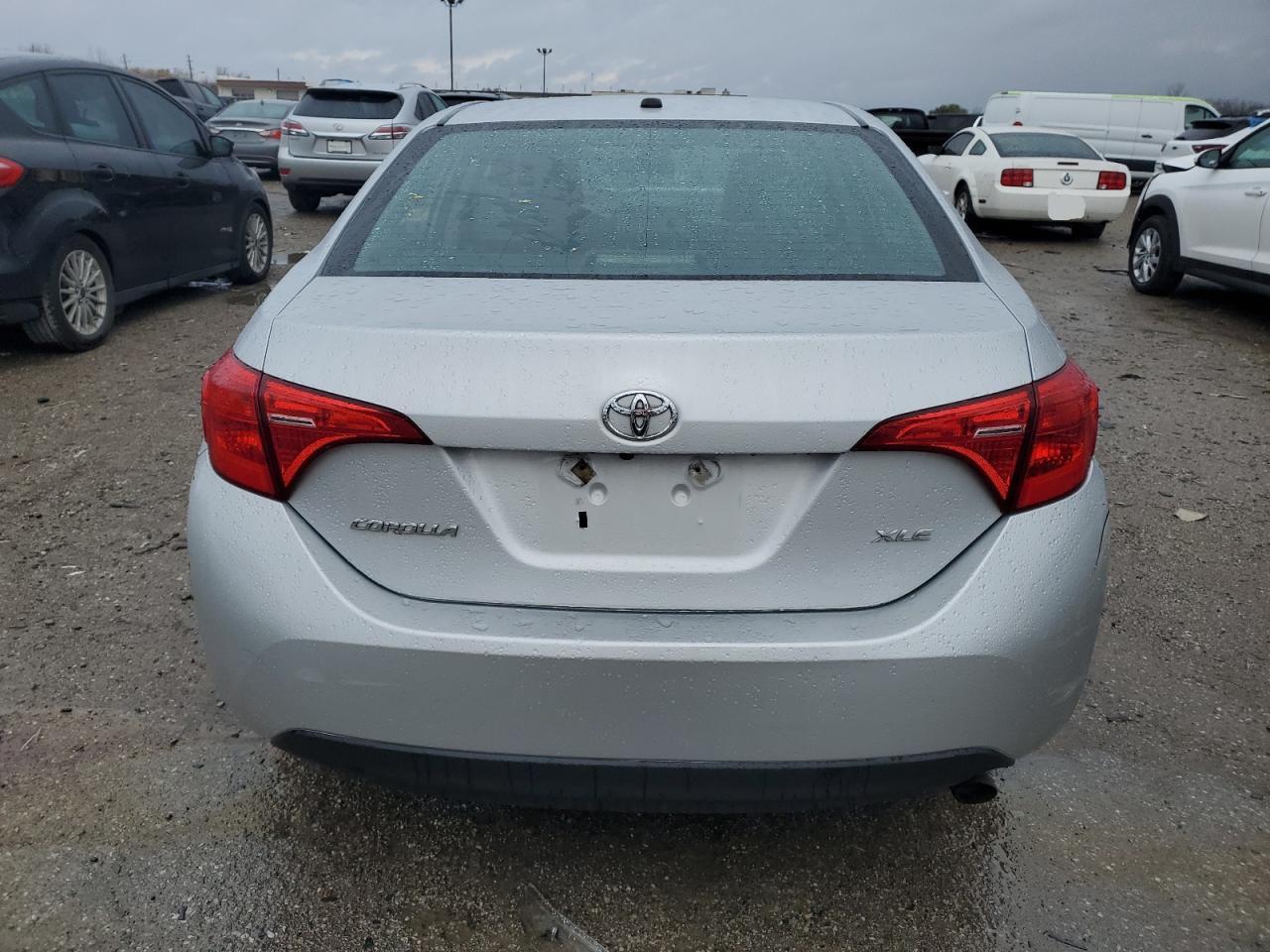 2018 Toyota Corolla L VIN: 2T1BURHE5JC007759 Lot: 80524294