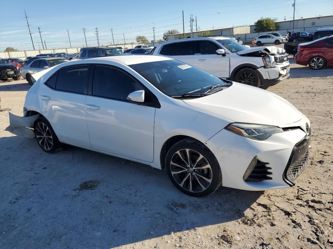 VIN 5YFBURHE4KP895180 2019 TOYOTA COROLLA no.4