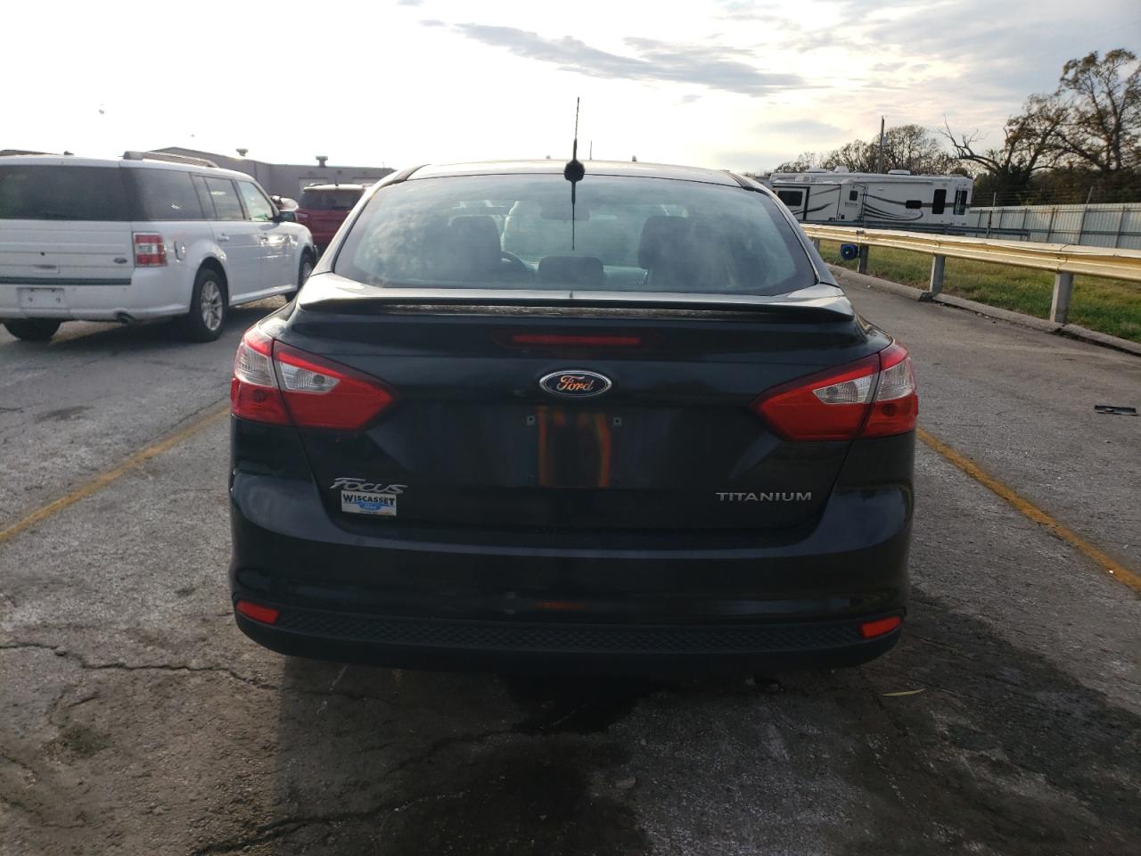 2012 Ford Focus Titanium VIN: 1FAHP3J28CL296989 Lot: 79629834