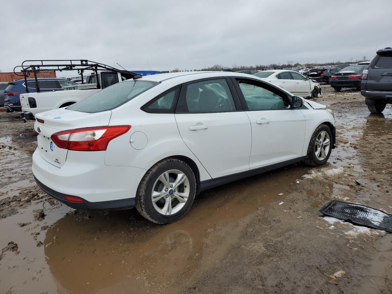 VIN 1FADP3F21EL234697 2014 FORD FOCUS no.3