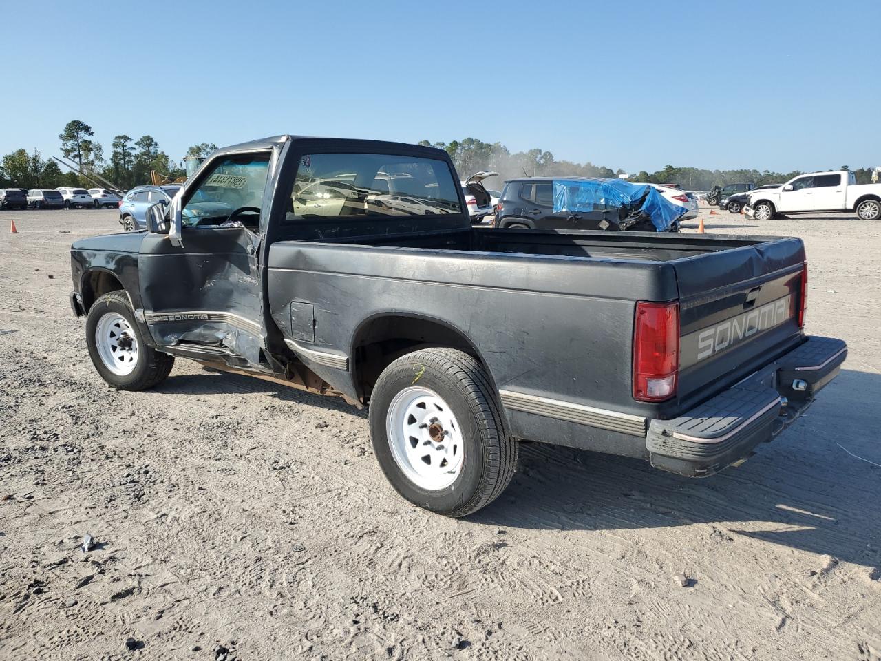 1991 GMC Sonoma VIN: 1GTCS14RXM2559524 Lot: 79871374