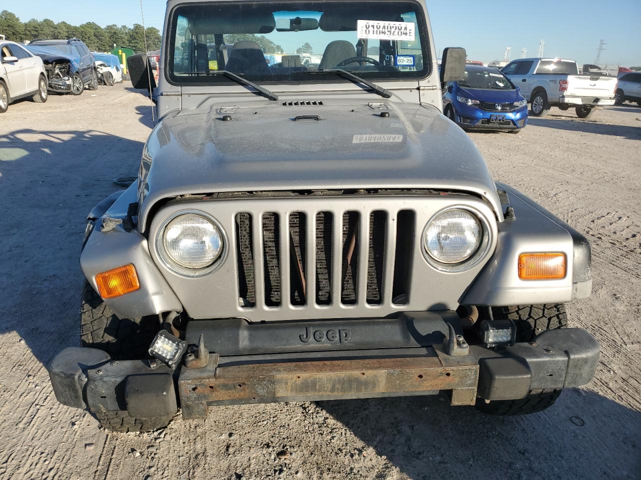 2002 Jeep Wrangler / Tj Sport VIN: 1J4FA49S12P730393 Lot: 81849284