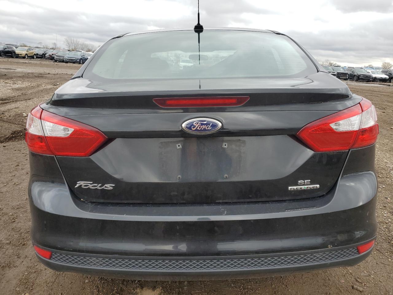 2014 Ford Focus Se VIN: 1FADP3F24EL244754 Lot: 77654134