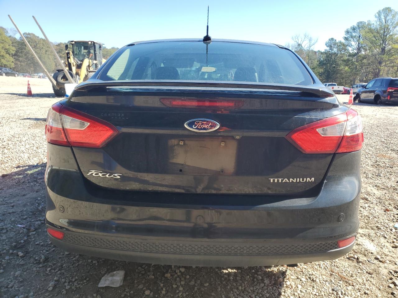 2014 Ford Focus Titanium VIN: 1FADP3J20EL103025 Lot: 80169614