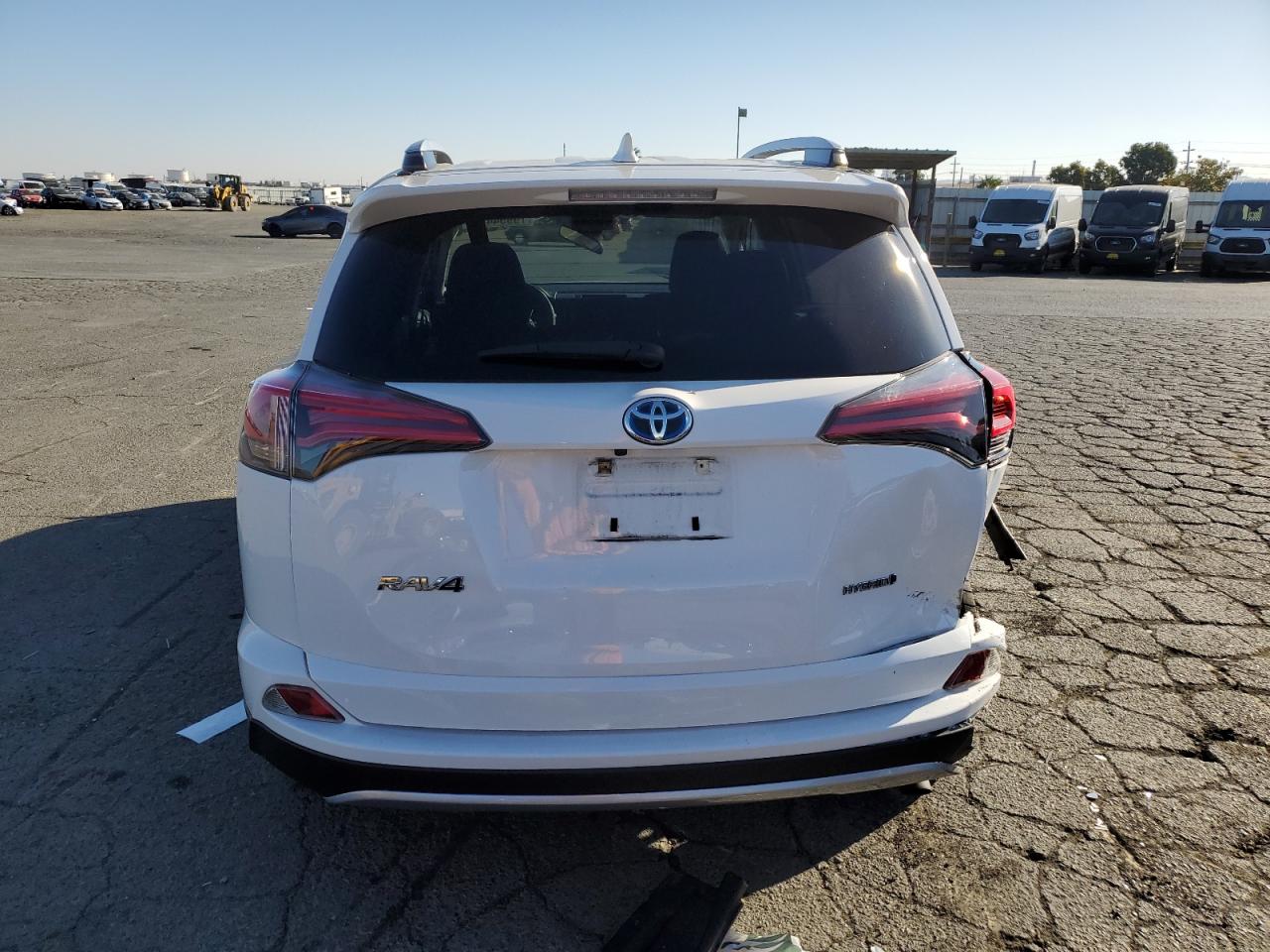 2018 Toyota Rav4 Hv Le VIN: JTMRJREV6JD210982 Lot: 79954414