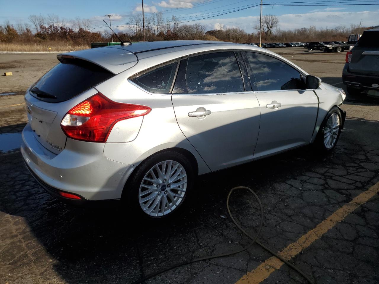 2014 Ford Focus Titanium VIN: 1FADP3N26EL194599 Lot: 79344684