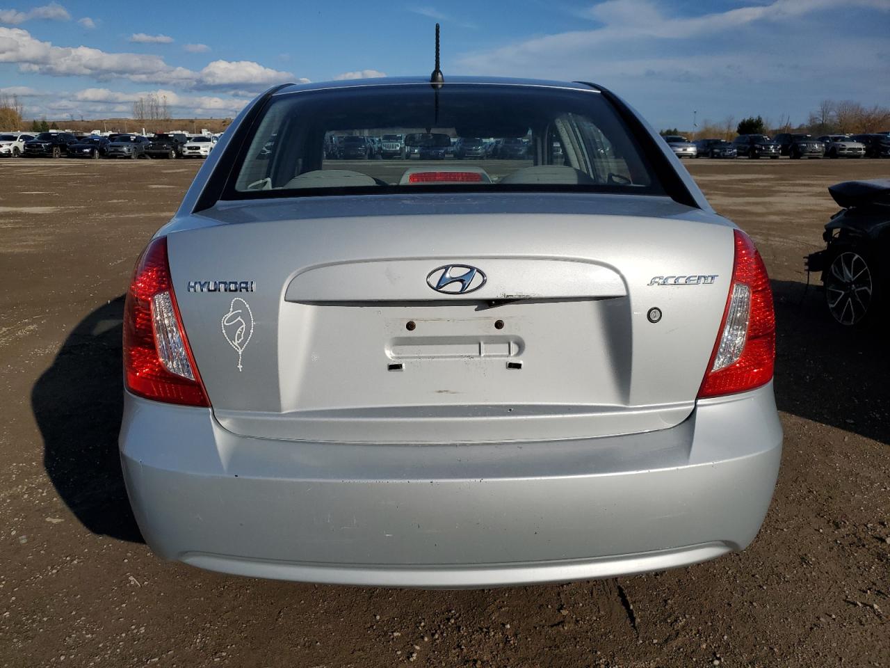 2006 Hyundai Accent Gls VIN: KMHCN45C56U049927 Lot: 79484234