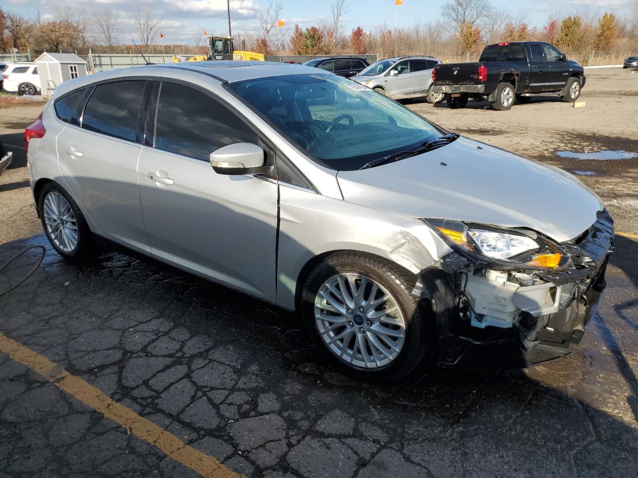 2014 Ford Focus Titanium VIN: 1FADP3N26EL194599 Lot: 79344684