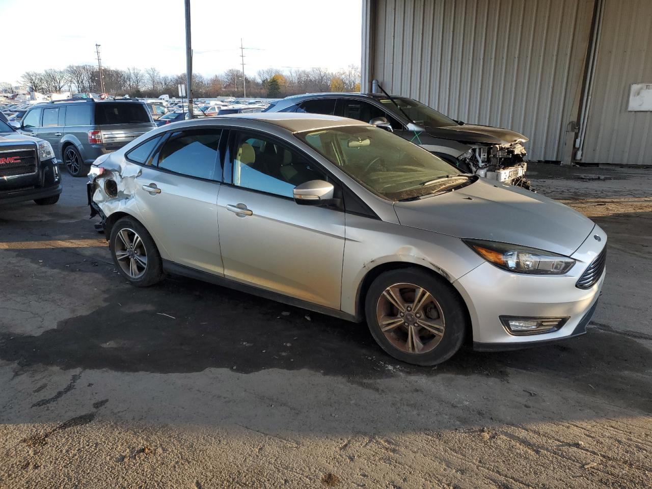 VIN 1FADP3FEXHL253683 2017 FORD FOCUS no.4