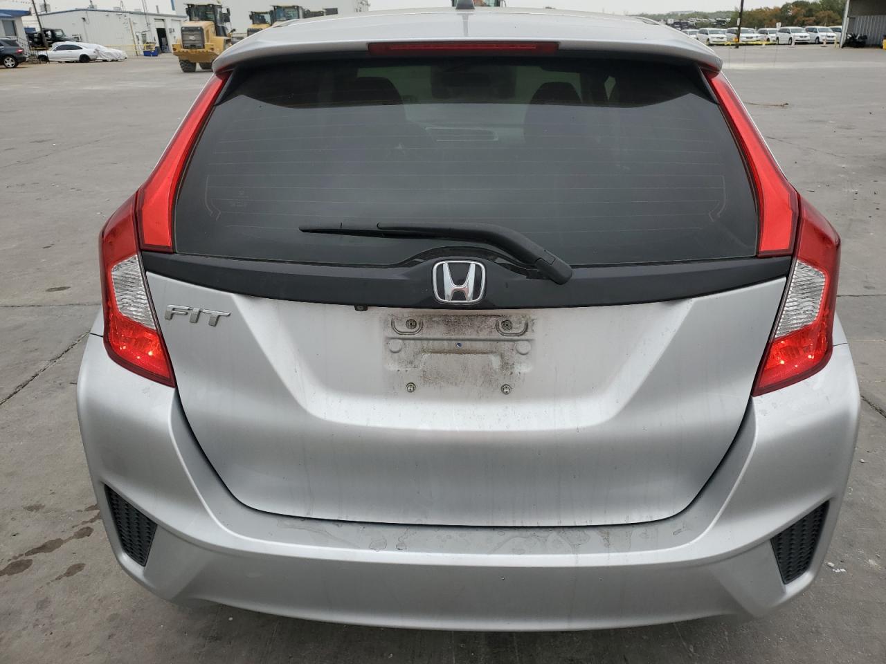 2016 Honda Fit Lx VIN: JHMGK5H55GX006348 Lot: 79704834