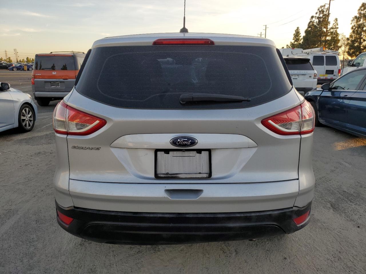 2014 Ford Escape S VIN: 1FMCU0F71EUE40844 Lot: 81406444