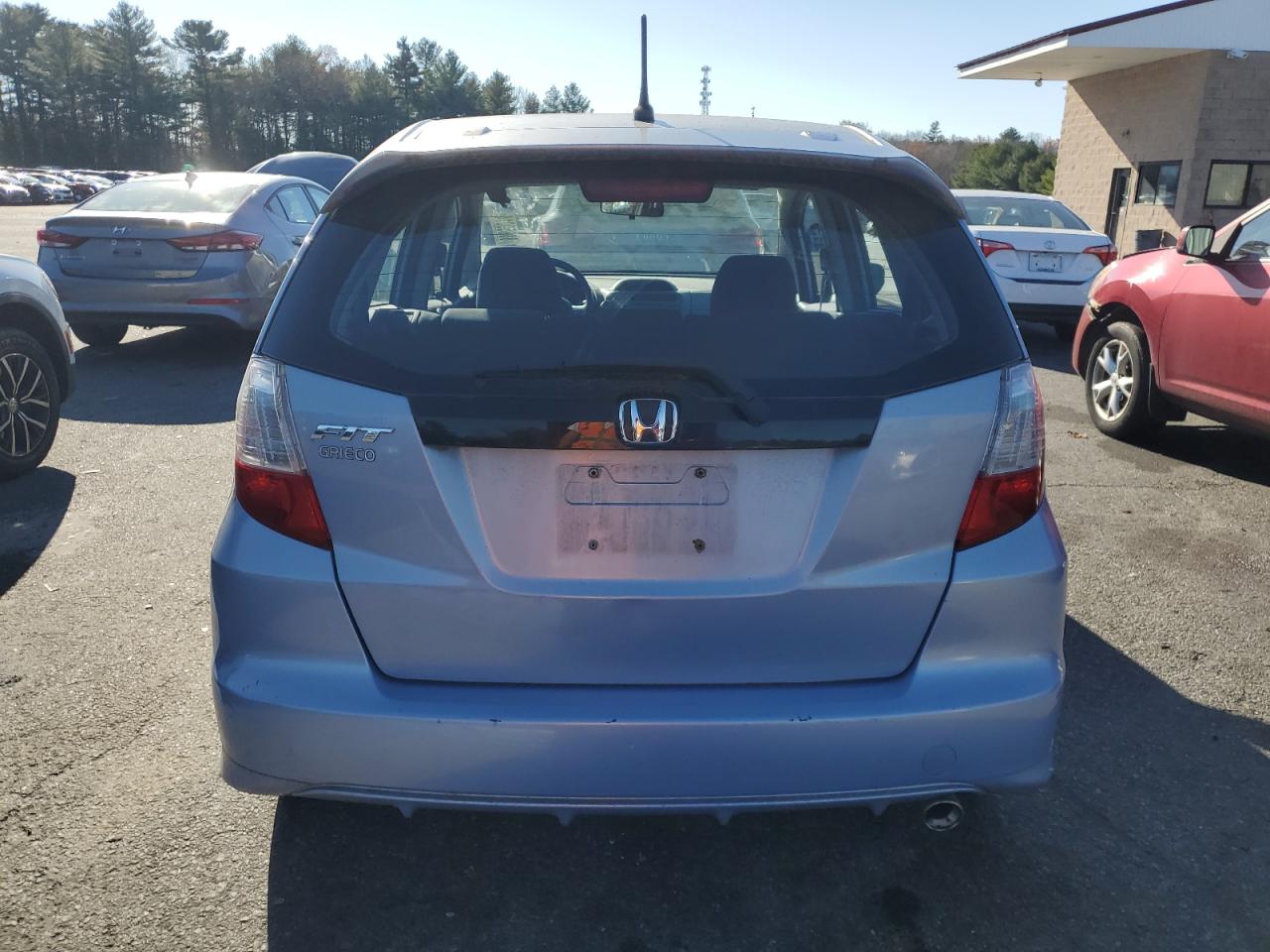 2009 Honda Fit Sport VIN: JHMGE88469S021232 Lot: 80859014